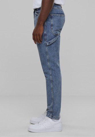 Karl Kani Flared Jeans in Blauw