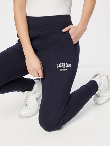 BJÖRN BORG Tapered Sportbroek in Blauw