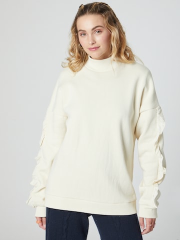 florence by mills exclusive for ABOUT YOU Sweatshirt 'Orchid' in Beige: voorkant