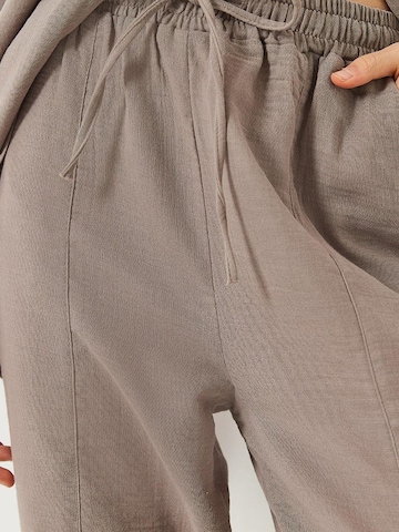 Bianco Lucci - Calças de fato em castanho