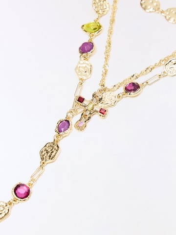 Chaîne Bershka en or