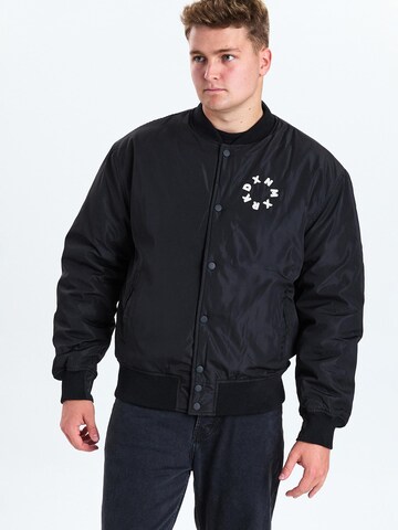 Dxnmxrk Winterjacke 'DXFir' in Schwarz: Vorderseite