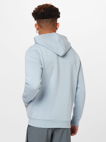 UNDER ARMOUR Sportsweatjacke 'Essential' in Blau