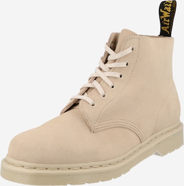 Dr. Martens - Bota com atacadores em bege: frente