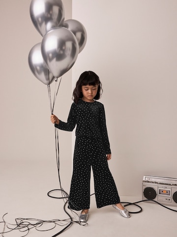 Next - Conjunto en negro: frente