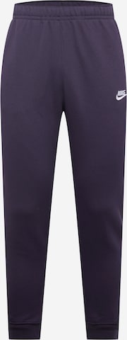 NIKE Sports trousers in Purple: front