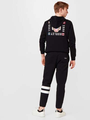 Hurley Zwężany krój Spodnie sportowe ' OCEANCARE' w kolorze czarny