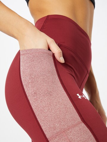 UNDER ARMOUR Skinny Sports trousers in Red