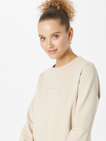 Calvin KleinSweater majica - bež boja