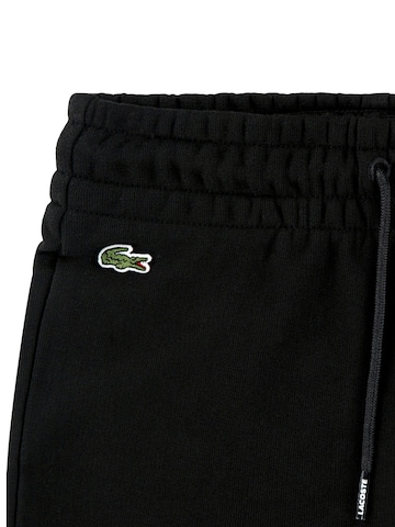 Regular Pantalon de sport LACOSTE en noir