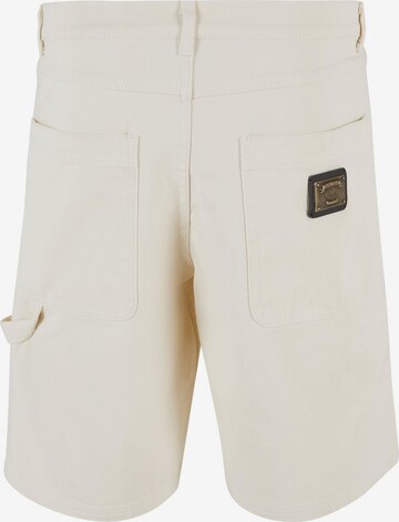 Karl Kani Regular Pants in Beige