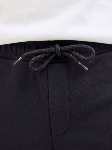 Jack & Jones Junior Szabványos Nadrág 'JPSTNEWSOFT' - fekete