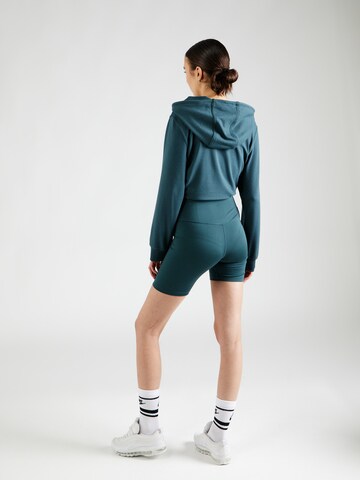 NIKE Skinny Sportshorts 'One' in Grün