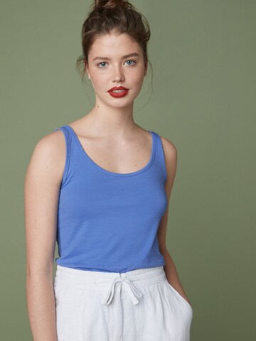 Haut Next en bleu : devant