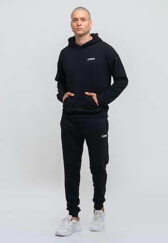 Tom Barron Sweatsuit in Black: front