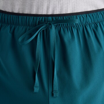 new balance - Loosefit Pantalón deportivo 'Essential' en azul