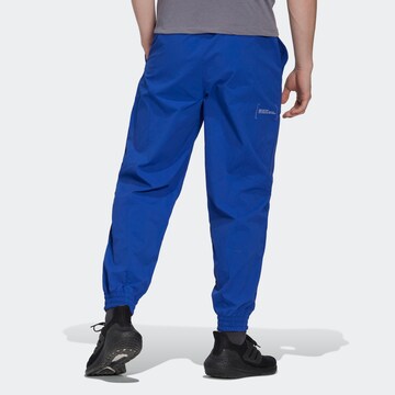 ADIDAS SPORTSWEAR Tapered Workout Pants in Blue