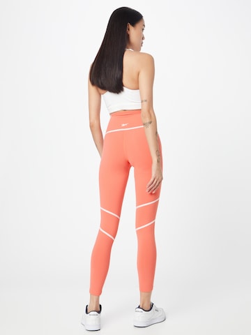 Reebok - Skinny Pantalón deportivo en naranja