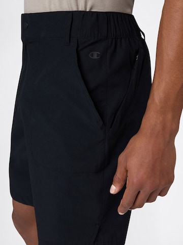 regular Pantaloni con piega frontale di Champion Authentic Athletic Apparel in nero
