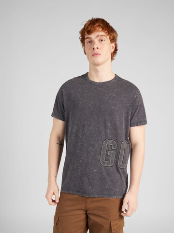 GUESS - Camiseta en negro: frente