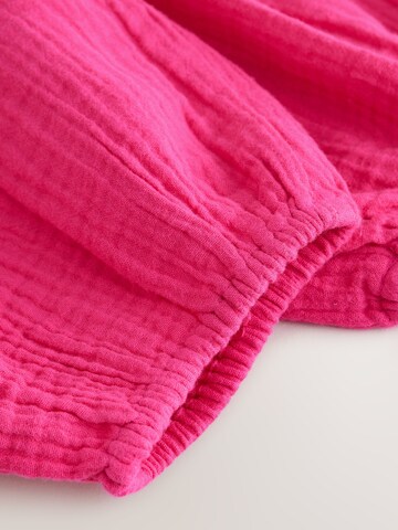 Next Zwężany krój Spodnie w kolorze różowy