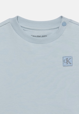 Calvin Klein JeansKomplet - plava boja: prednji dio