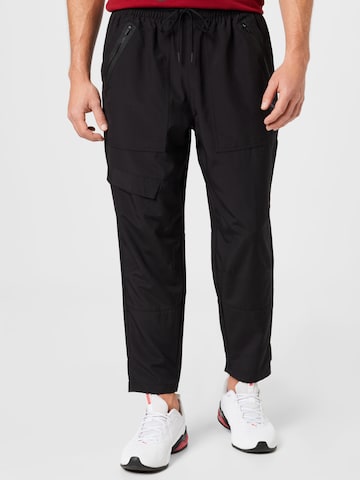 PUMA Loose fit Workout Pants 'First Mile' in Black: front