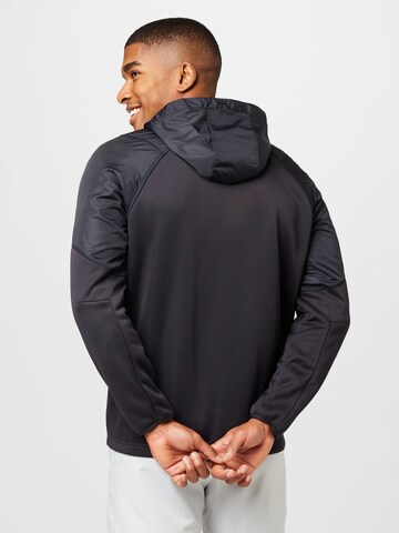 UNDER ARMOUR - Sudadera con cremallera deportiva en negro