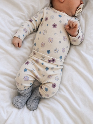 LouieLouie Rompertje/body 'Louie rib ∼ Flowering' in Beige