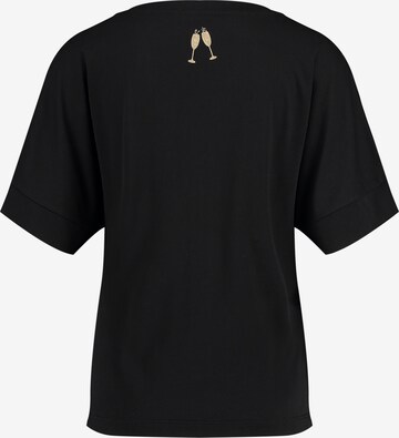 Key Largo Koszulka 'WT CHAMPAGNE' w kolorze czarny