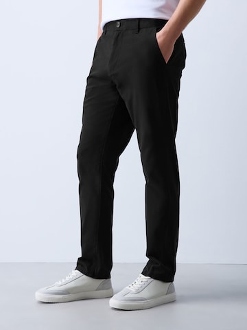 Next Slimfit Lærredsbukser i sort: forside