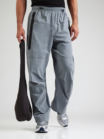 Loosefit Pantalon Nike Sportswear en gris : devant