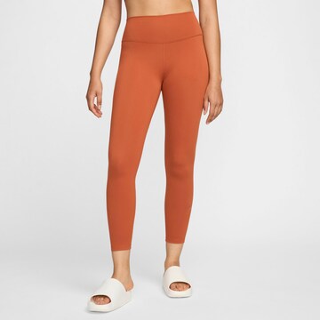 NIKE Skinny Workout Pants in Bronze: front