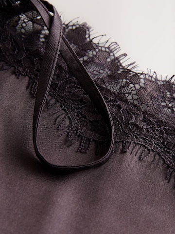 Top de la Next pe maro