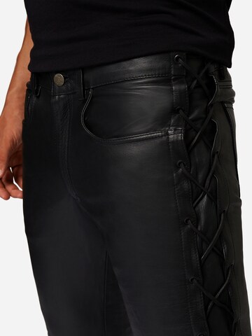 Skinny Pantaloni 'Cow Waxy' di RICANO in nero