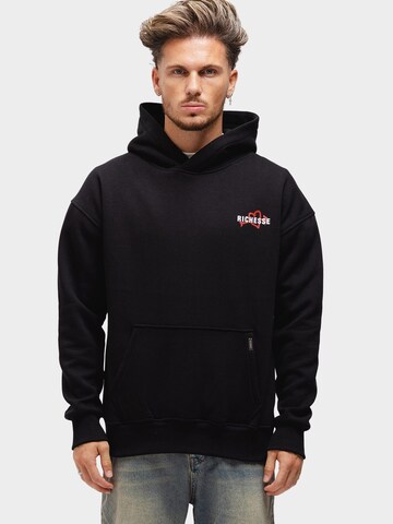 Richesse Sweatshirt 'UNEXPECTED HOODIE BLACK' in Zwart: voorkant