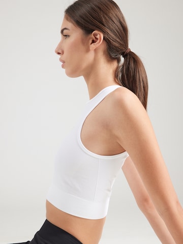 Top sportivo 'Define' di ICANIWILL in bianco