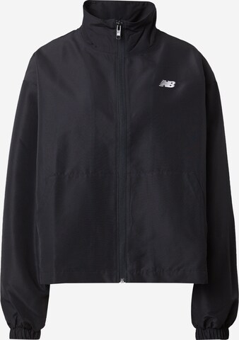 new balance - Chaqueta de entretiempo en negro: frente