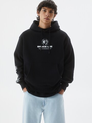 Pull&BearSweater majica - crna boja: prednji dio