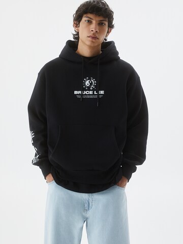 Sweat-shirt Pull&Bear en noir : devant