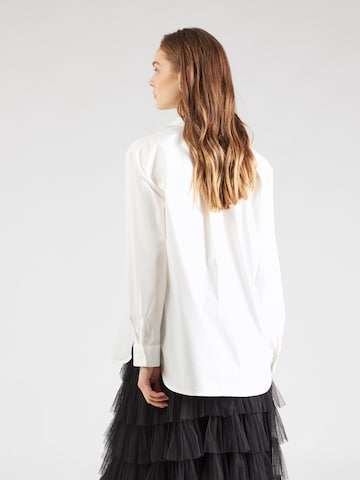 Sisley - Blusa en blanco