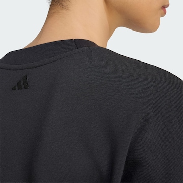 ADIDAS SPORTSWEAR Αθλητική μπλούζα φούτερ 'Seasonal Essentials' σε μαύρο