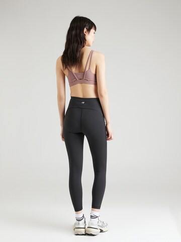 new balance Skinny Spodnie sportowe 'Essentials' w kolorze czarny