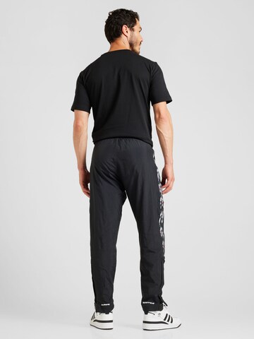 regular Pantaloni sportivi 'Pride Tiro' di ADIDAS SPORTSWEAR in nero