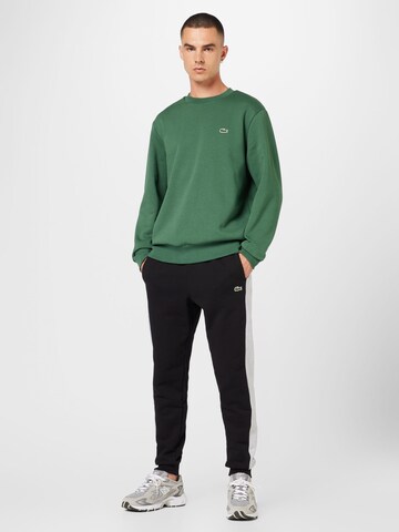 LACOSTE Tapered Sporthose in Schwarz