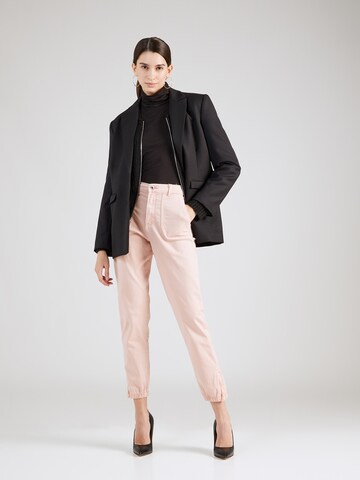 Slimfit Pantaloni di Marks & Spencer in rosa