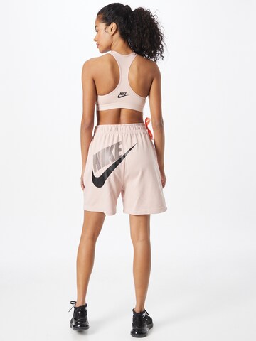 rožinė Nike Sportswear Laisvas Kelnės