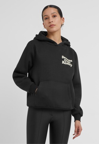 Miss Tee Sweatshirt 'Dreams Over Reality' in Black: front