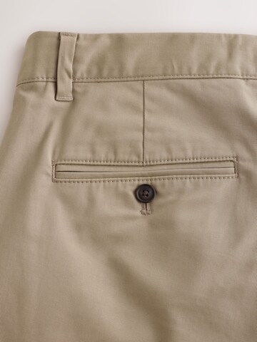 Slimfit Pantaloni chino di Next in grigio