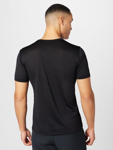 Champion Authentic Athletic Apparel - Camisa funcionais em preto